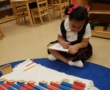 child writing number at preschool and daycare at 339 Virginia Parkway