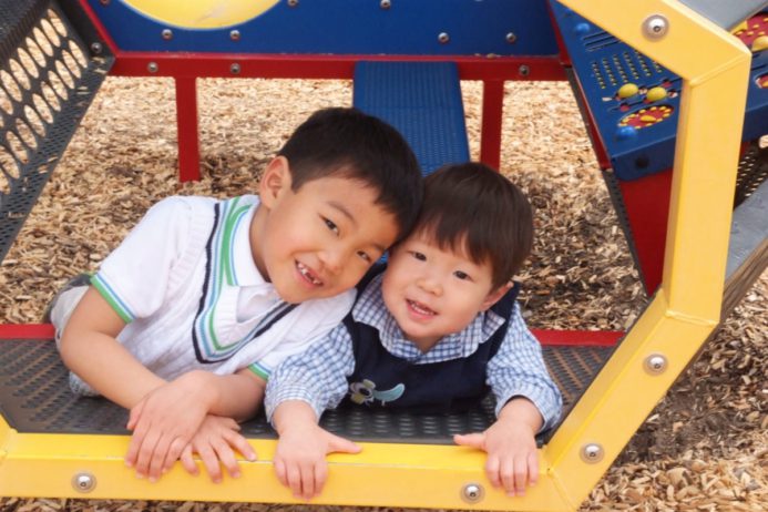 two children playing outside