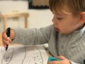A child drawing indoors