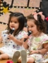 two female children singing at little big minds chandler