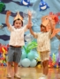 two male children performing at little big minds chandler