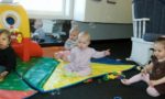 Daycare staff interacting with children