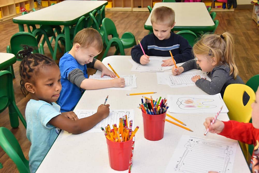 a group of children drawing