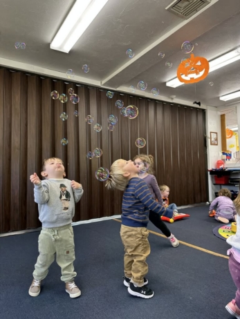 children playing with bubbles in preschool and daycare classroom at cadence academy preschool 450 whitman washington