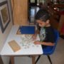 A-boy-learning-to-count-at-our-Montessori-school-in-Roseville-MN-4f7a5e5c5c-300x300