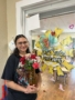 teacher posing for preschool and daycare anniversary at 326 acl