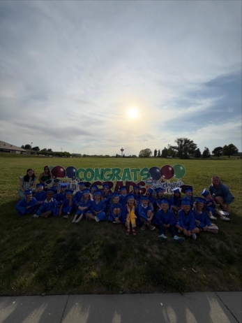 Children graduating outside at the professors learning center daycare and preschool elkhorn NE 509