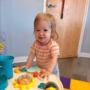 Child playing with toy at the professors learning center daycare and preschool elkhorn NE 509