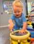 child playing with drum at the professors learning center daycare and preschool elkhorn NE 509