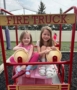 Children posing on playground smiling in firetruck play structure at the professors learning center daycare and preschool elkhorn NE 509
