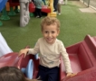 male child playing happy on playground at watch me grow germann