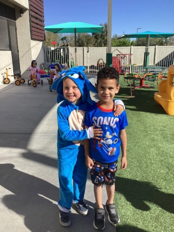two male children posing smiling at watch me grow riggs
