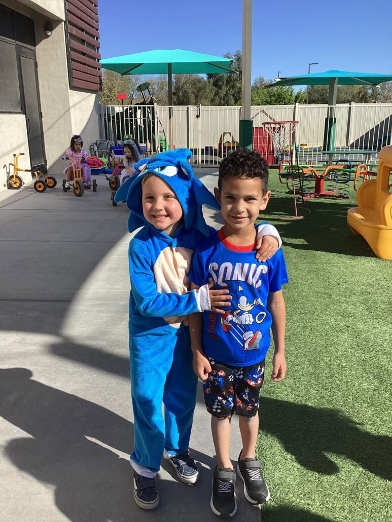 two male children posing smiling at watch me grow riggs