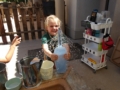 child engaged in a sensory water play activity at natural choice academy