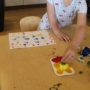 child participating in a fine motor and creative learning activity at natural choice academy